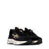 Sneaker PREMIATA Moerund bimateriale
Nero/oro